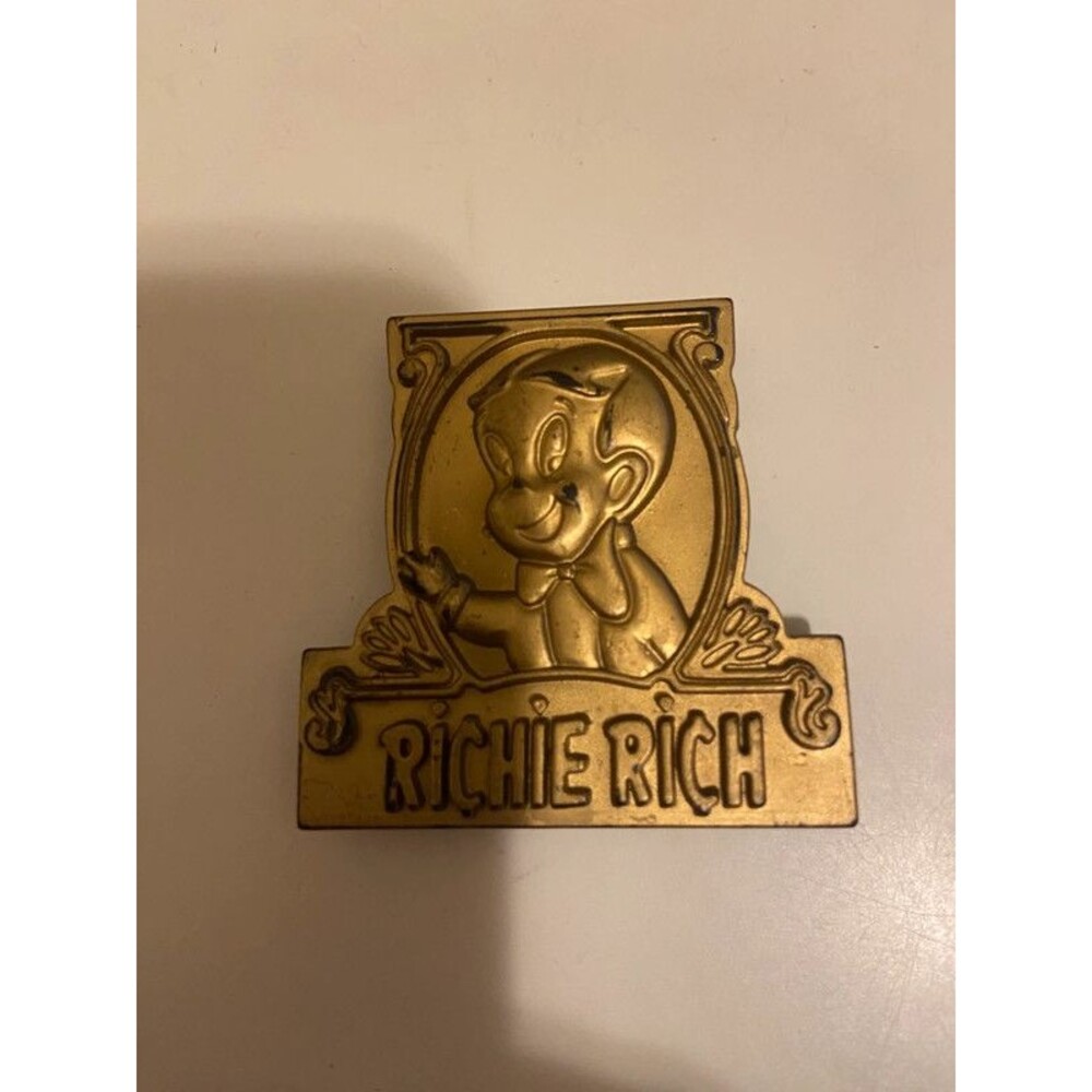 Vintage gold plastic Rich Rich movie plastic money clip